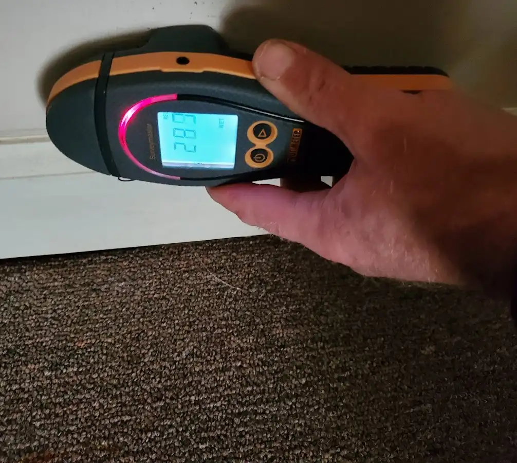 Moisture detection at baseboard during Burst Pipe Cleanup in Sandy Springs
